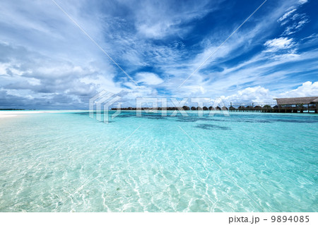 Beautiful beach with water bungalows Beautiful beach with water bungalows 9894085
