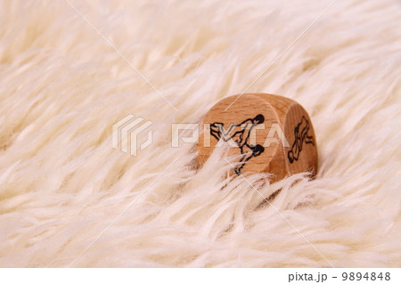 White lambskin with sex cube as background 9894848