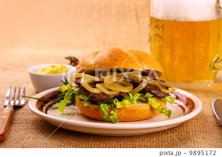 Ochsen Semmel - Grilled beef with onion rings in bun Ochsen Semmel - Grilled beef with onion rings in bun 9895172