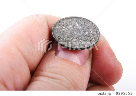 old coin in hand 9895555