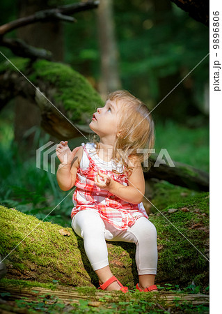 Little girl in the forest Little girl in the forest 9896806