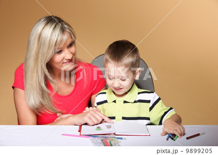 mother and son drawing together mother and son drawing together 9899205