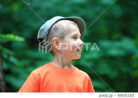 kid little boy in cap outdoor 9900285