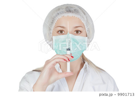 Pretty nurse with an injection and uniform. Isolated. 9901713