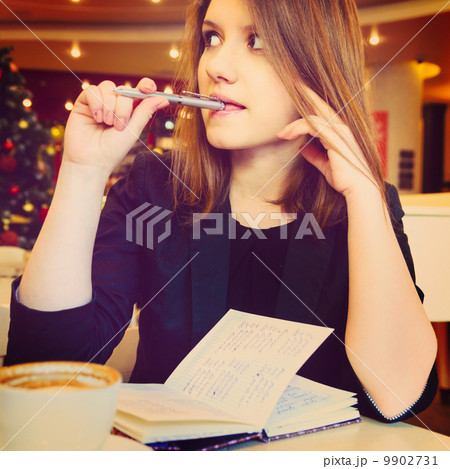 young woman with notebook 9902731