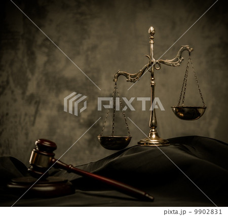 Scales and wooden hammer on judge's mantle Scales and wooden hammer on judge's mantle 9902831