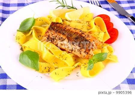 Grilled salmon fillet with taglateli, lemon and herbs Grilled salmon fillet with taglateli, lemon and herbs 9905396