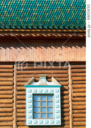 decorated window of old russian log house 9905650