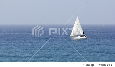 boat with white sails 9906343