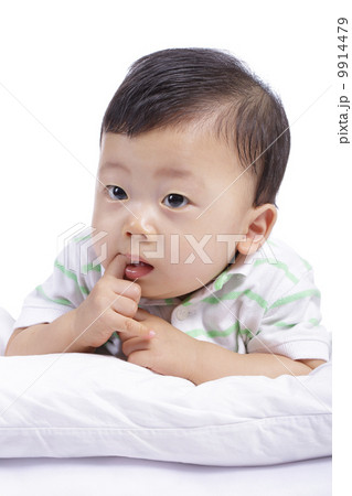 little boy smile and do activity something 9914479