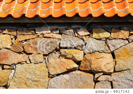 stone wall with red clay roof stone wall with red clay roof 9917142