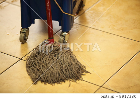 cleaning the floor with a mop cleaning the floor with a mop 9917330