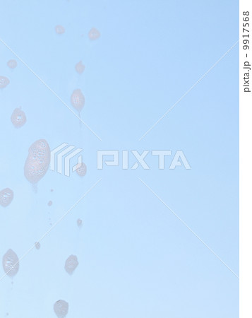 Drops on the windowpane cleaning window 9917568