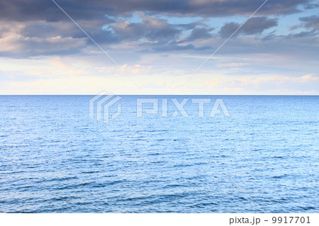 cloudy blue sky leaving for horizon blue surface sea cloudy blue sky leaving for horizon blue surface sea 9917701