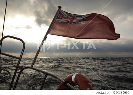 British maritime ensign flag boat and stormy sky 9918066
