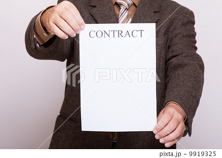 Businessman holding blank paper with sign contract Businessman holding blank paper with sign contract 9919325
