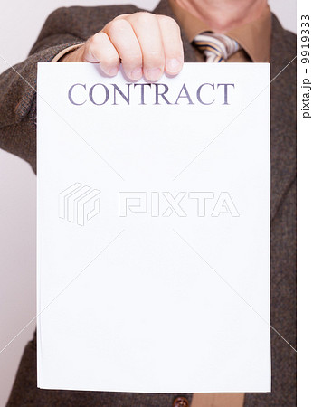 Businessman holding blank paper with sign contract Businessman holding blank paper with sign contract 9919333
