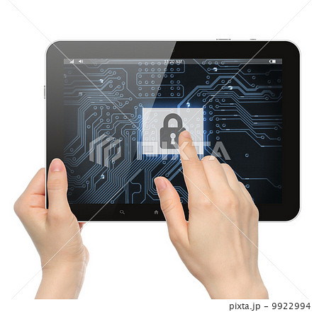 Hand pushing virtual security button on digital background of tablet PC . 9922994