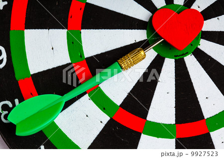 Black white target with dart in heart love symbol as bullseye Black white target with dart in heart love symbol as bullseye 9927523