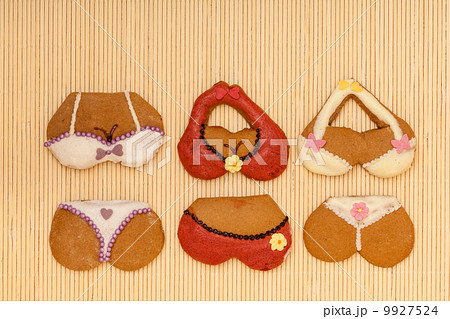 Funny colorful bikini shape gingerbread cakes cookies on bamboo mat 9927524