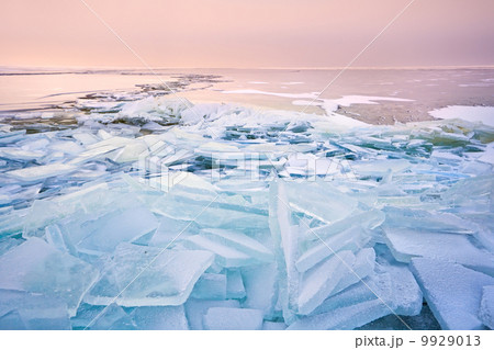 broken shelf ice pieces at sunset on North sea 9929013
