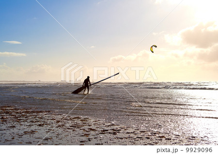 kitesurfer on beach in waves kitesurfer on beach in waves 9929096
