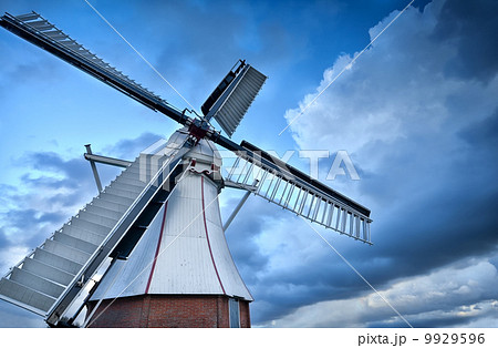 Dutch windmill over blue sky Dutch windmill over blue sky 9929596