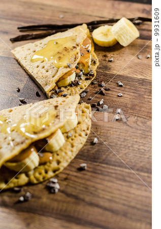 Banana Pancakes With Choco Chips On Table Banana Pancakes With Choco Chips On Table 9931609