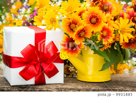 Gift box and spring flowers 9931885