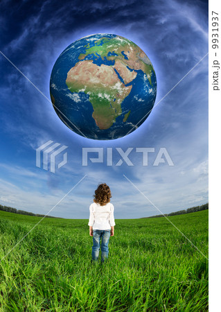 Child looking at the Earth planet 9931937