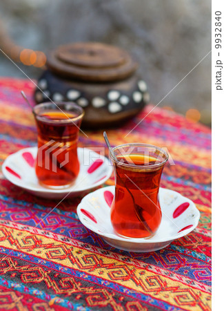Black Turkish tea in traditional glasses 9932840