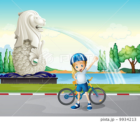 A young biker near the statue of Merlion A young biker near the statue of Merlion 9934213