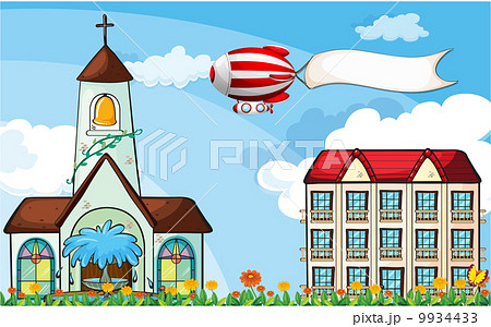 A balloon with an empty banner flying near the church 9934433