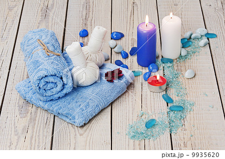Spa massage setting with thai herbal compress stamps. 9935620