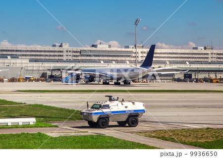 Police vehicle patrols airport in Munich. Police vehicle patrols airport in Munich. 9936650