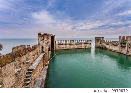 Medieval walls and Lake Garda. 9936839