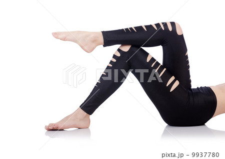 Woman legs with stockings on white 9937780