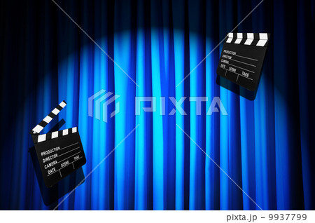 Movie clapper board against curtain 9937799