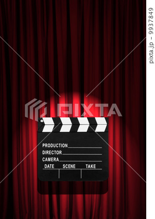 Movie clapper board against curtain Movie clapper board against curtain 9937849