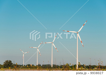 Wind mills during bright summer day Wind mills during bright summer day 9938027