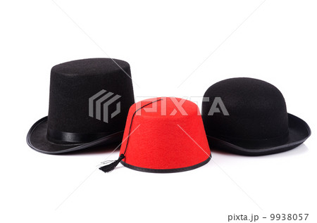 Various hats isolated on the white 9938057
