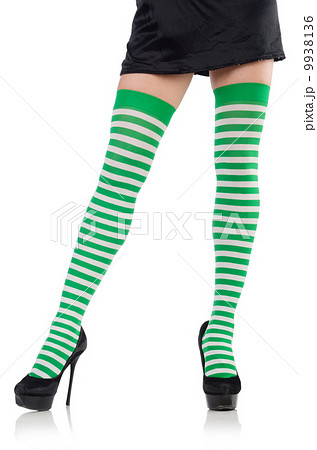 Woman legs with stockings on white 9938136