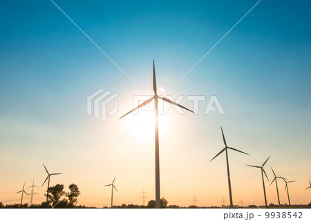 Wind mills during bright summer day 9938542