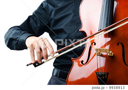 Hands playing cello at the concert 9938913