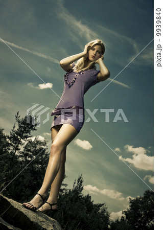 blond girl in purple dress blond girl in purple dress 9939840