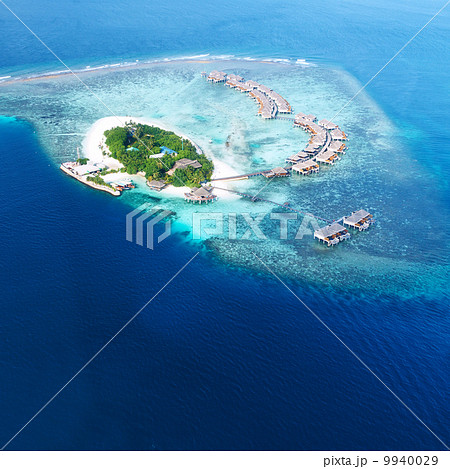Atolls and islands in Maldives from aerial view Atolls and islands in Maldives from aerial view 9940029