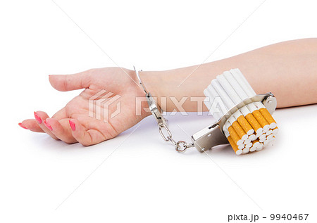 Addition concept with cigarettes and handcuffs 9940467