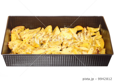 Roasted potatoes with spices and cheese Roasted potatoes with spices and cheese 9942812