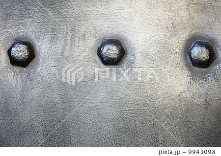 Black metal plate or armour texture with rivets Black metal plate or armour texture with rivets 9943098