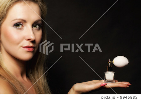 portrait beautiful woman with perfume bottle 9946885